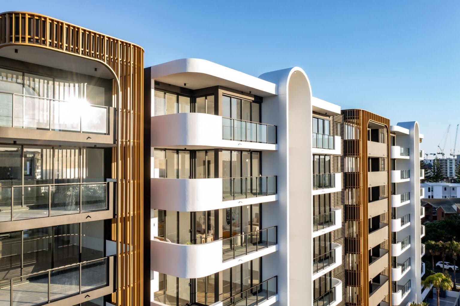 A Large Building With A Lot Of Windows And Balconies β Harrison Development Group In Surfers Paradise, QLD