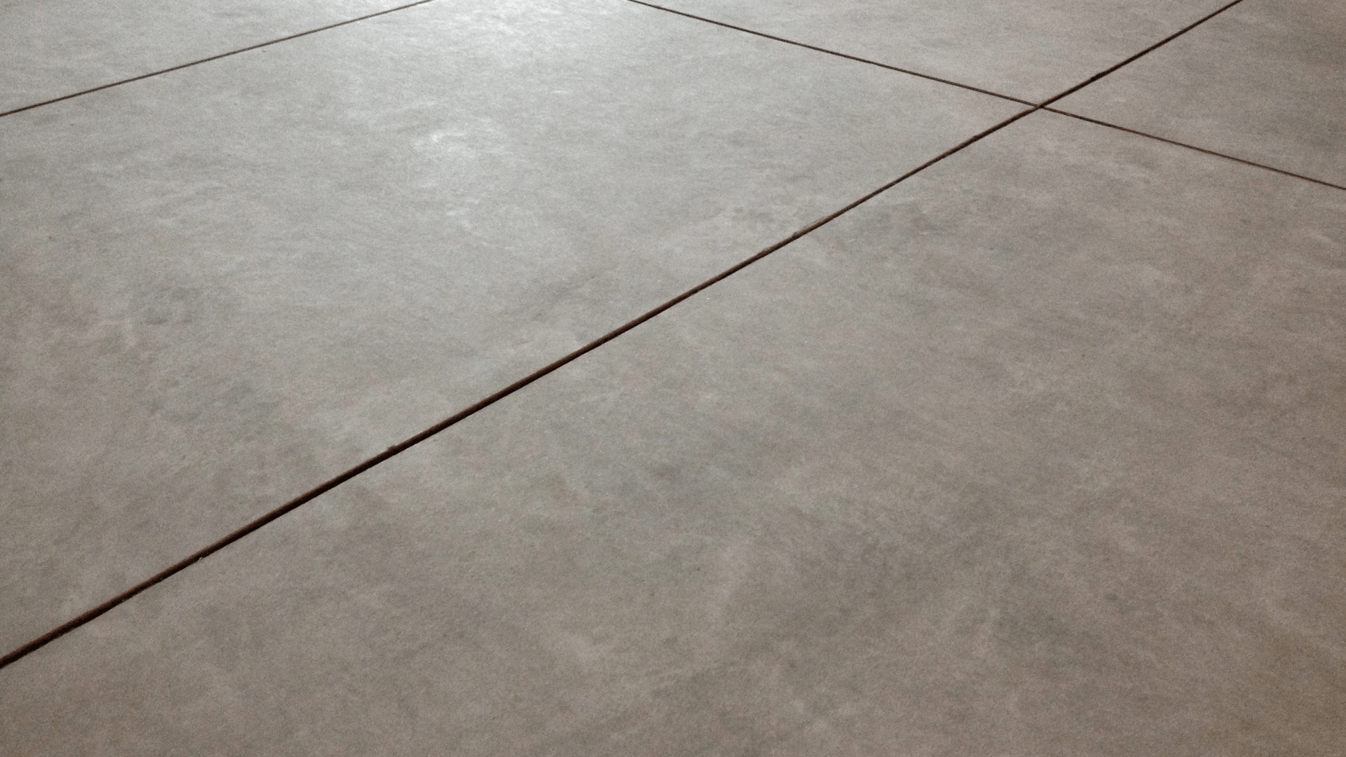 A concrete floor perfectly leveled with different concrete slabs that do not need concrete repair