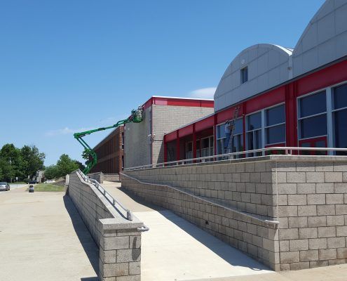 a large building with a ramp leading up to it