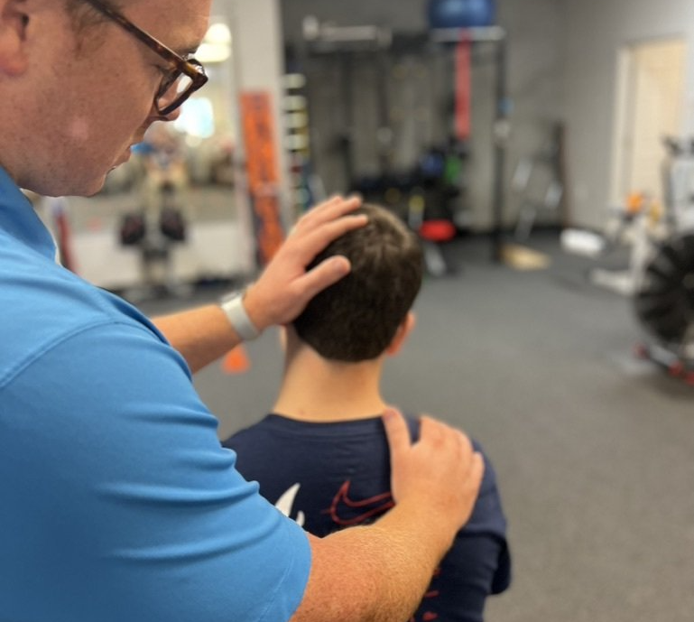 Back in the Game Physical Therapy staff offering head pain relief