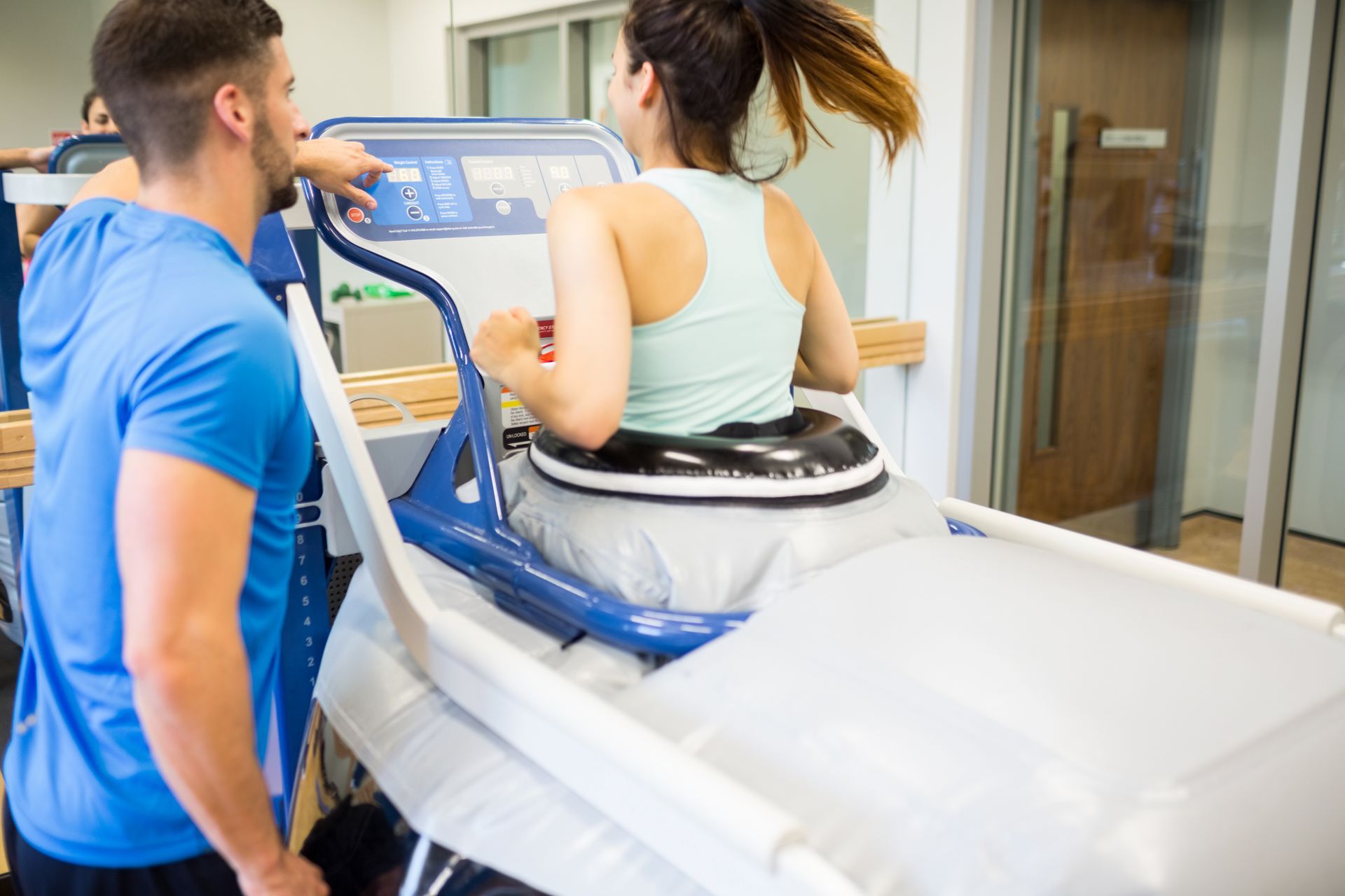 woman running on an AlterG - anti gravity treadmill 