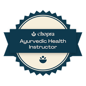A badge that says chopra ayurvedic health instructor