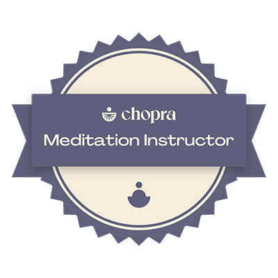 A badge that says chopra meditation instructor on it