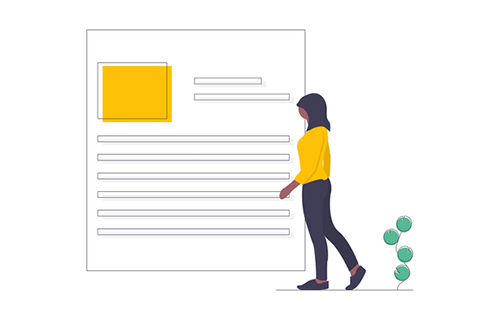 A woman is standing in front of a large piece of paper.