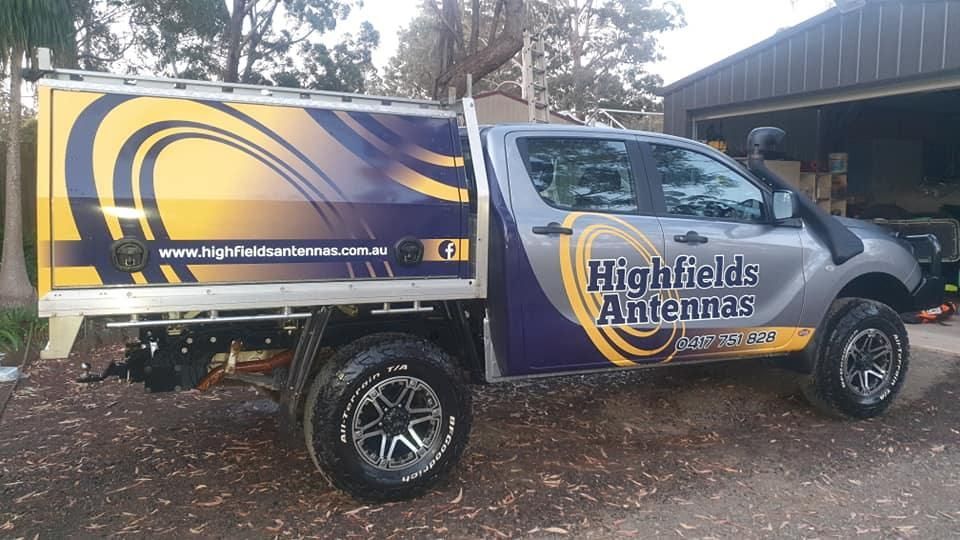 A Highfields Antennas Truck Is Parked In Front Of A Building— Highfields Antennas In Cabarlah, QLD