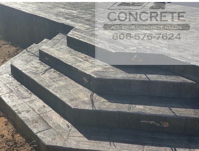 A set of concrete steps with a phone number on the bottom