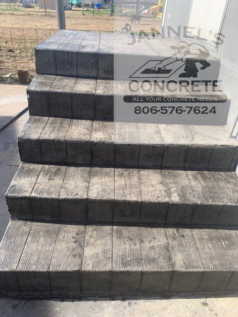 A set of concrete steps with a sign that says concrete