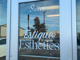 Suite 4 Estique Esthetics on glass door
