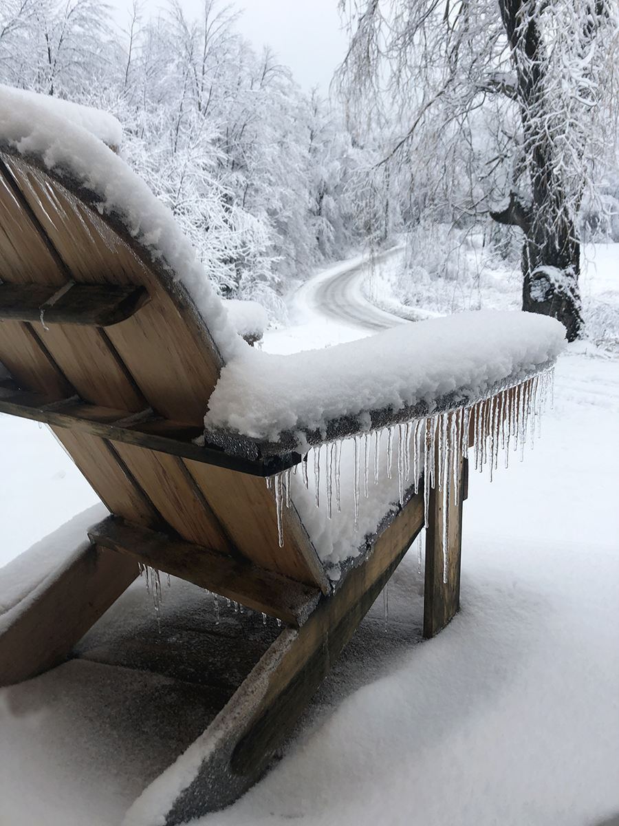 snow covered chair