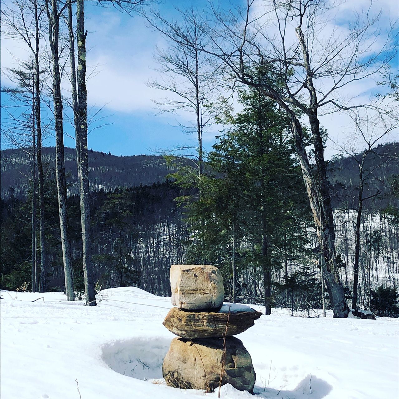 stack of rocks in the snow