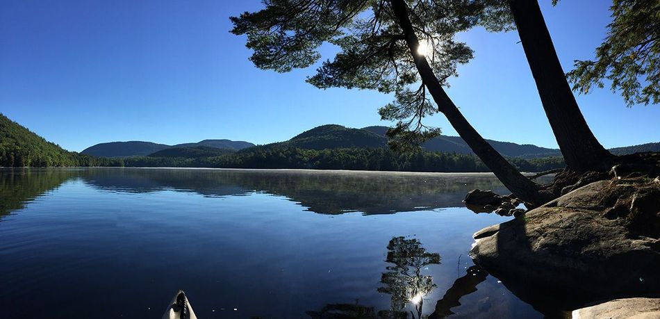 calm-lake-surrounded-by-forest