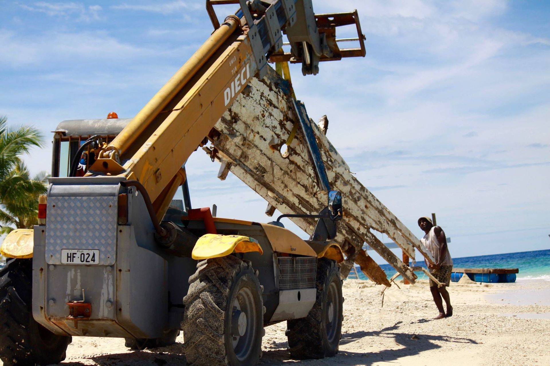 a heavy lift crane on the beach