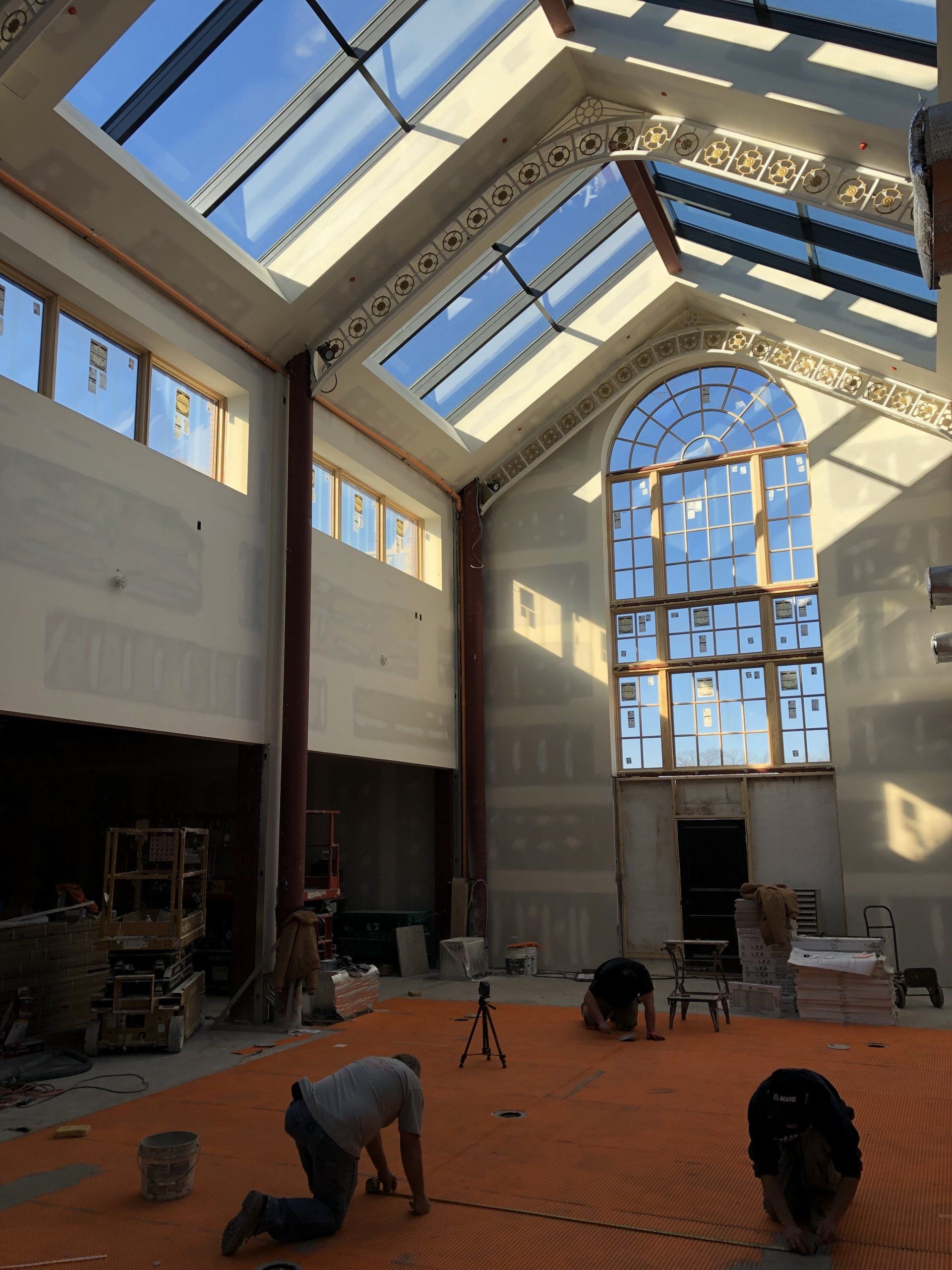 A large building under construction with a lot of windows