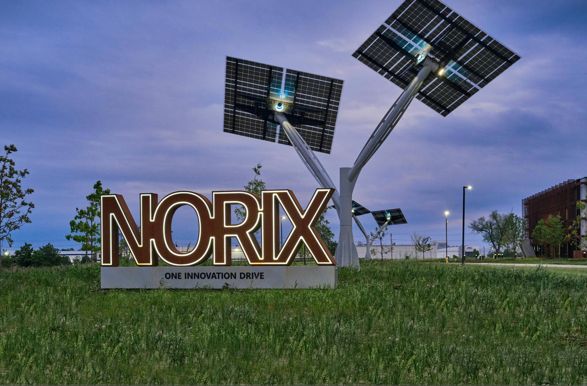A norix sign with solar panels in the background