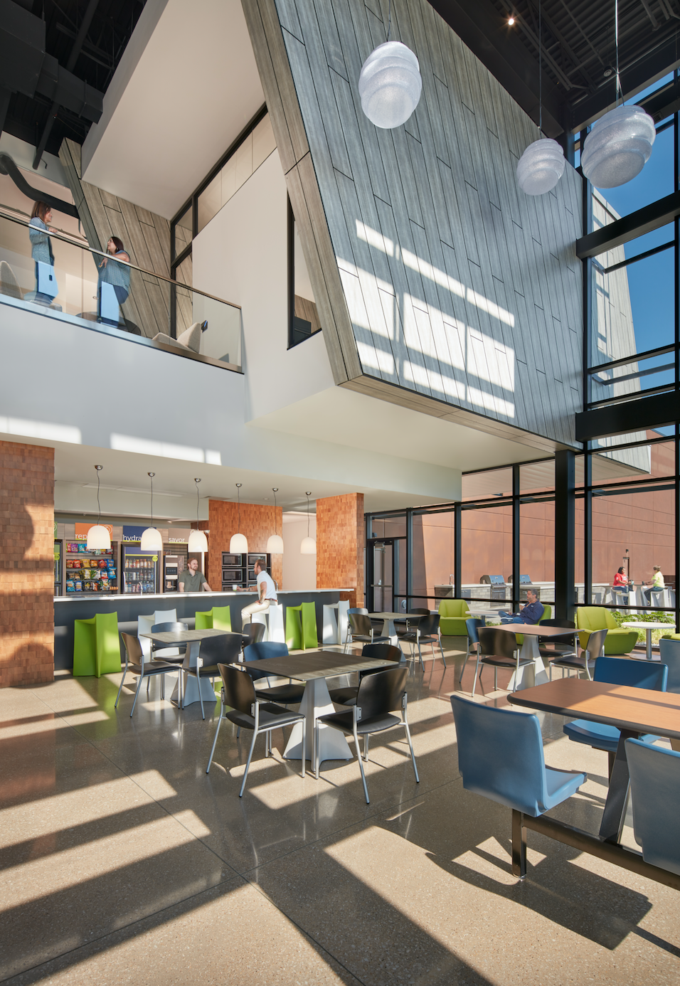 An artist 's impression of a restaurant with tables and chairs