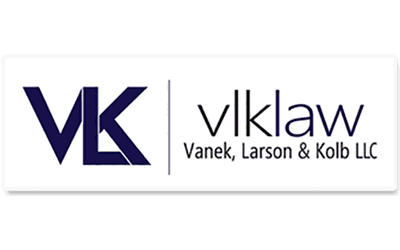 A logo for a law firm called vk vlklaw vanek , larson & kolb llc