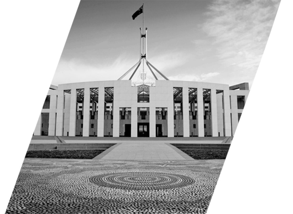 A black and white photo of the australian parliament building