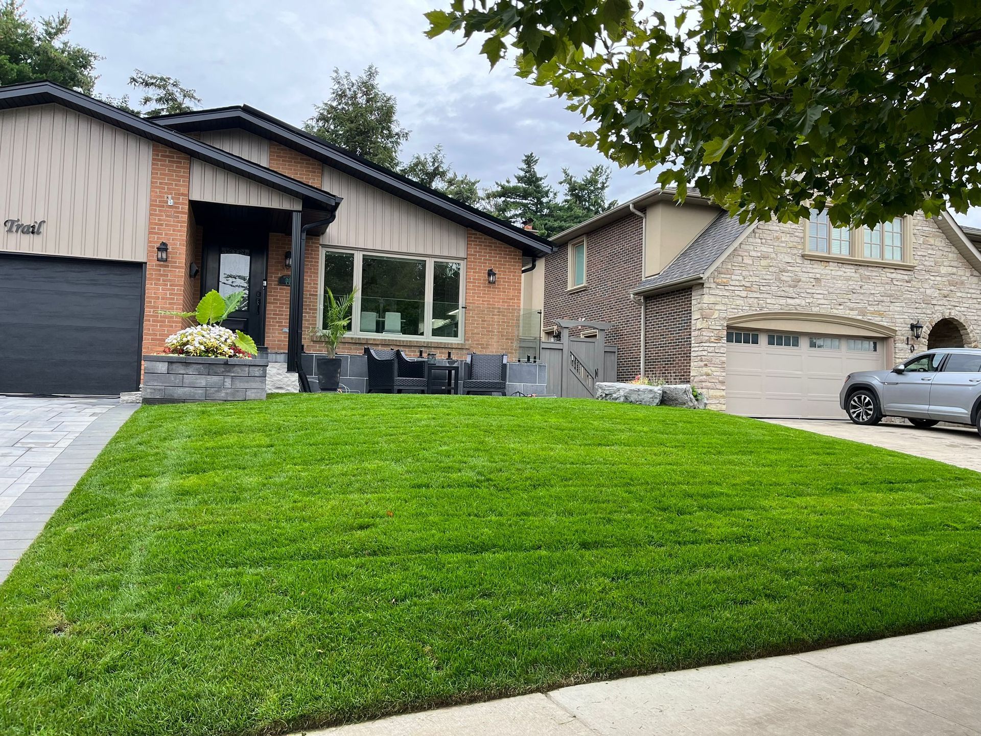A front lawn with new laid grass