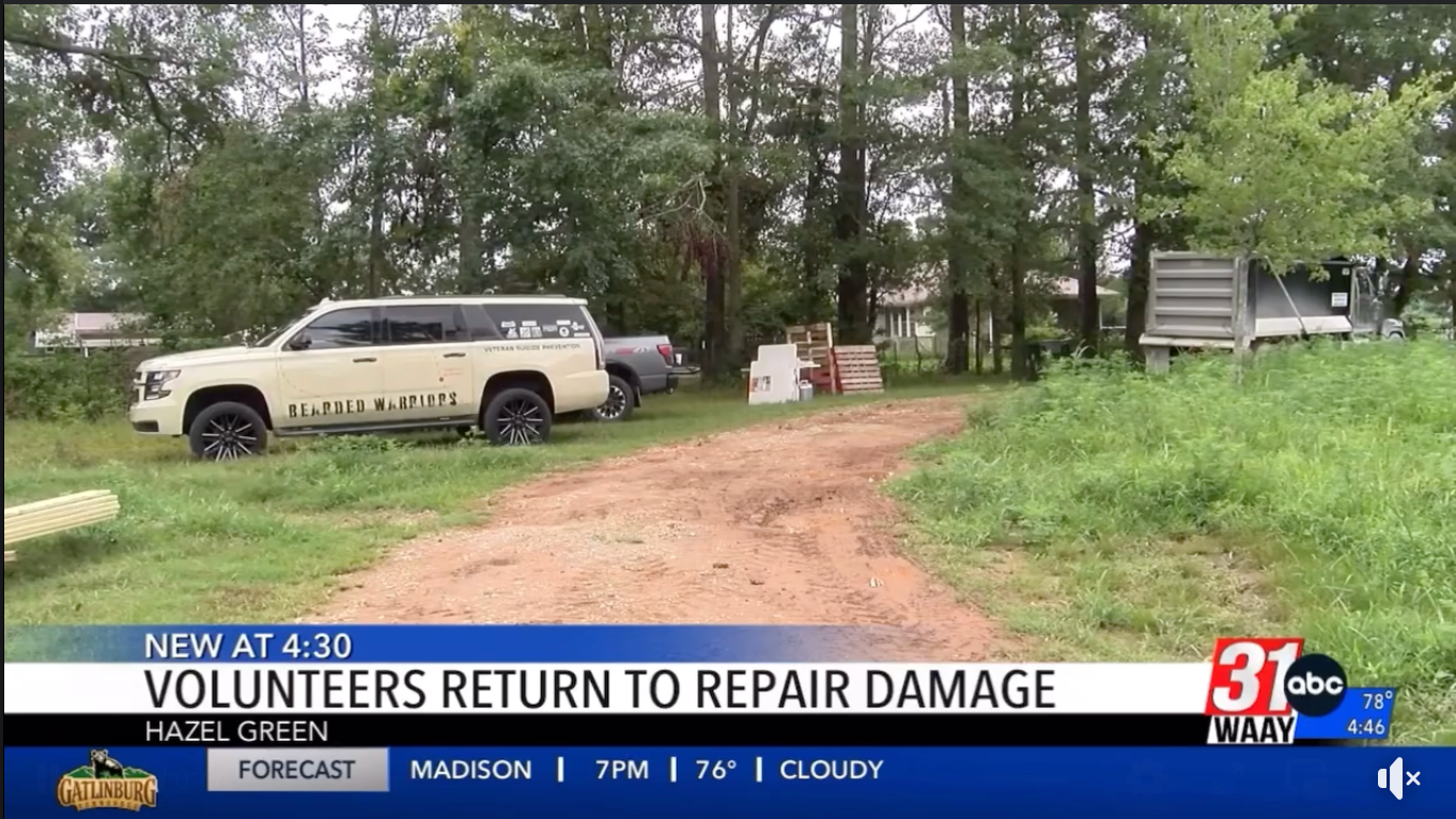 Volunteers are returning to repair damage to a house