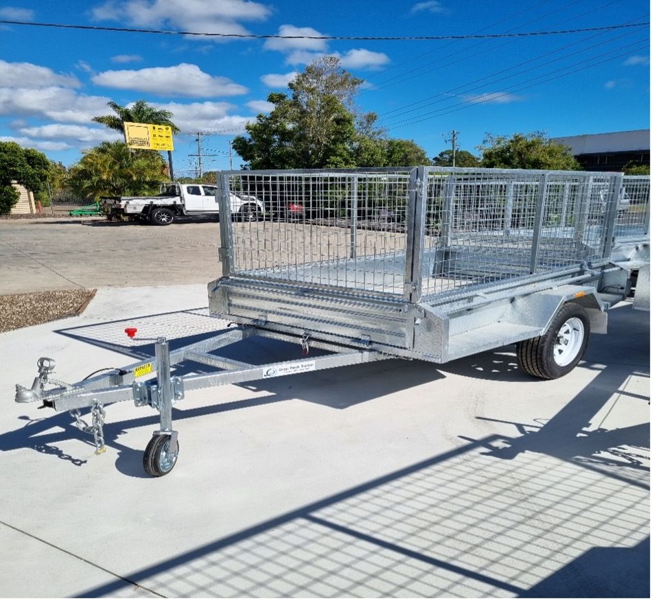 A Trailer is Parked on The Side of The Road in a Parking Lot — Drop Deck Trailers In Urangan QLD