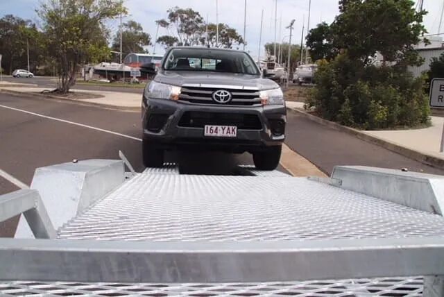 Toyota Vehicle Loading To The Trailer Front View — Drop Deck Trailers In Urangan QLD