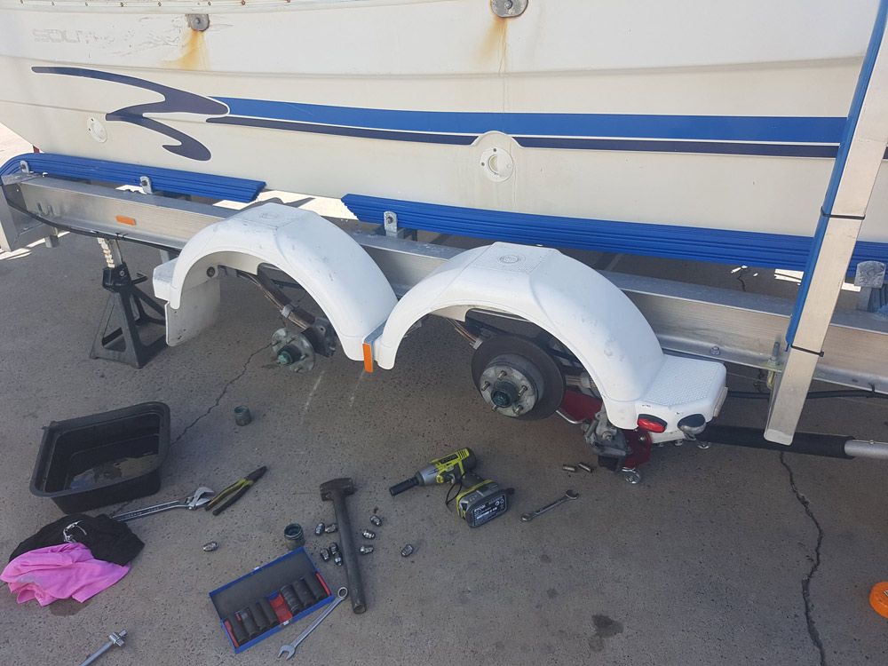 Two Wheel On The Trailer Under Repairing On The Shop — Drop Deck Trailers In Maryborough QLD