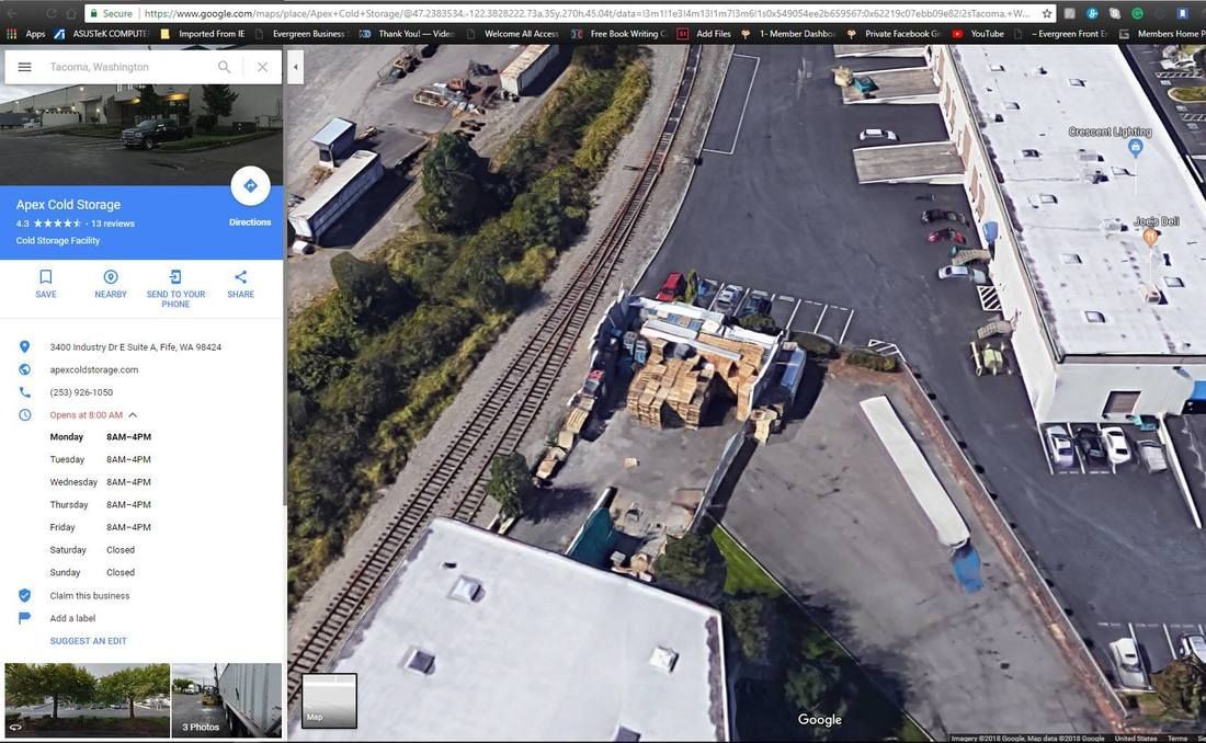 An aerial view of a building with a large supply of pallets to resale
