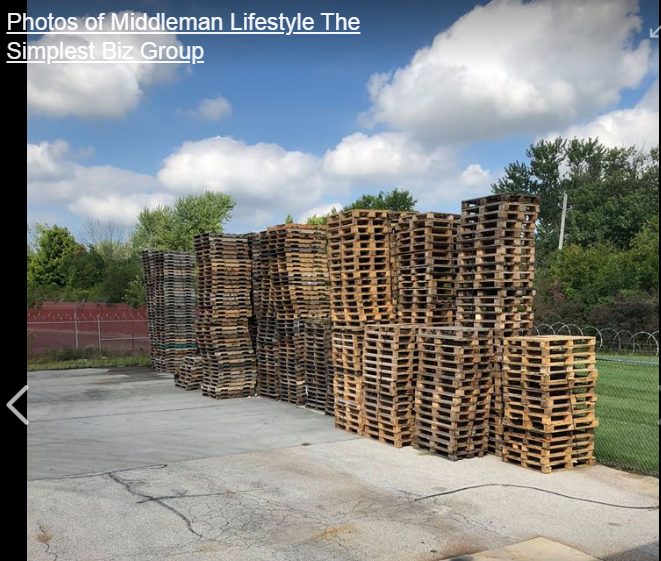 Wooden pallets stacked high—discover the profitable pallet recycling business with The Simplest Biz Training
