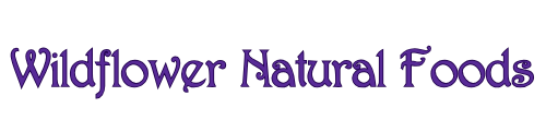 The logo for wildflower natural foods is purple on a white background.