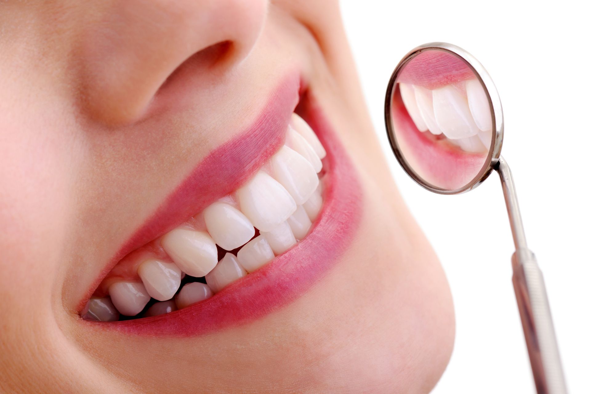 Beautiful smiling model with dental mirror | Geelong Dental Group | Geelong, VIC 
