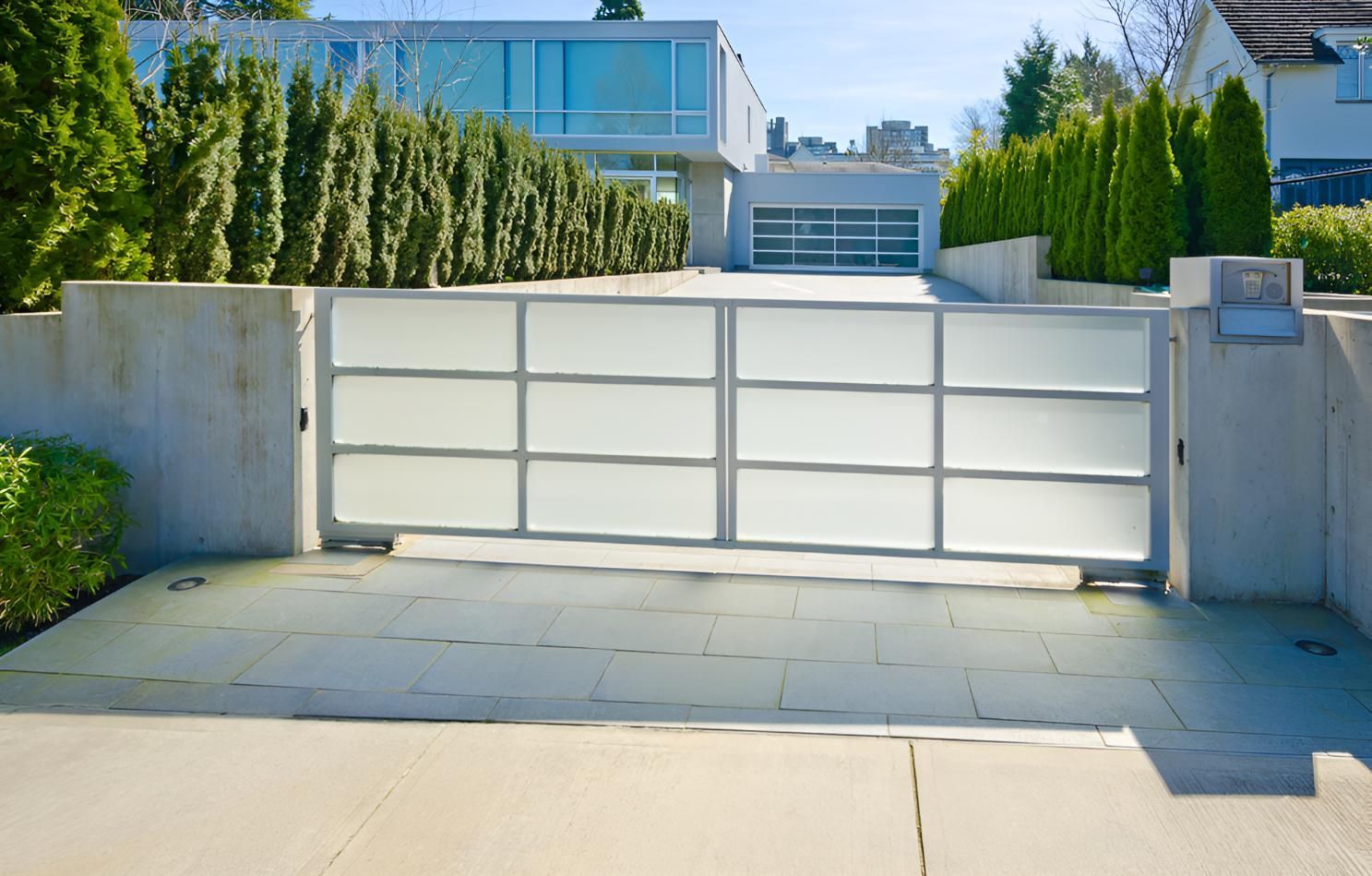 A Modern House With A Sliding Gate — Angel Conveyancing In Larrakeyah, NT