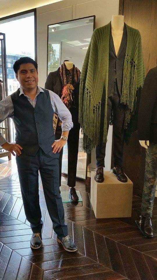 person standing near custom made clothing