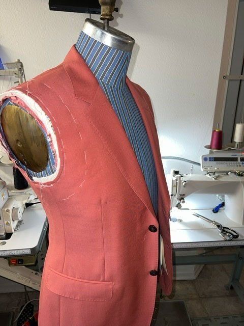 tailoring a red jacket