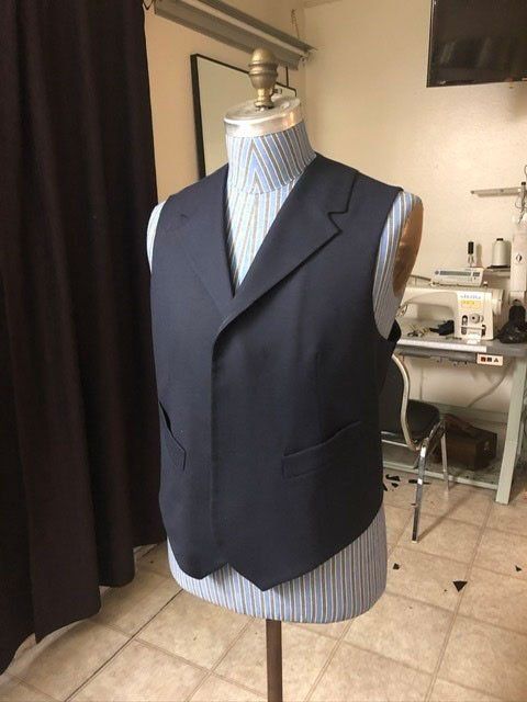 tailoring a black vest