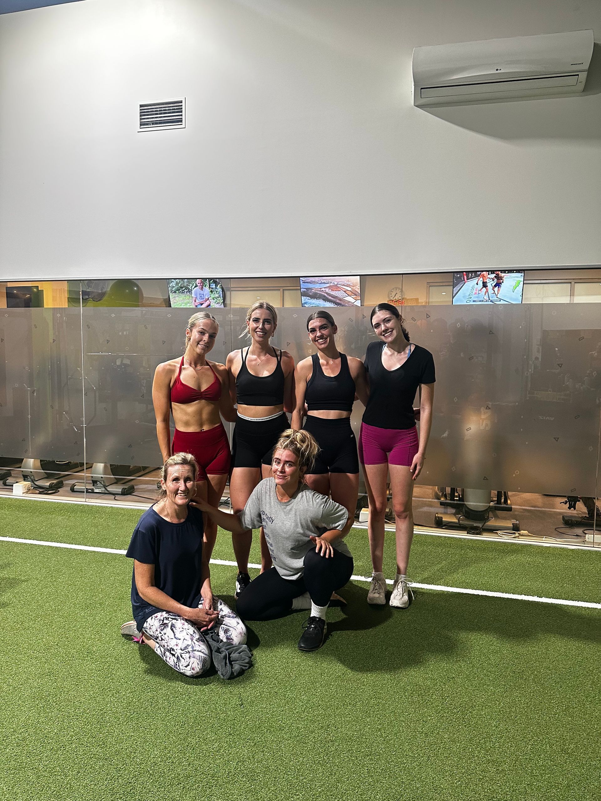 Woman posing for picture after their workout— ifeelgood 24/7 Oxenford In Oxenford, QLD