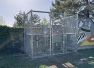 A Metal Fence Is Surrounding a Playground in A Backyard — Nuevo, CA — Golden West Fence