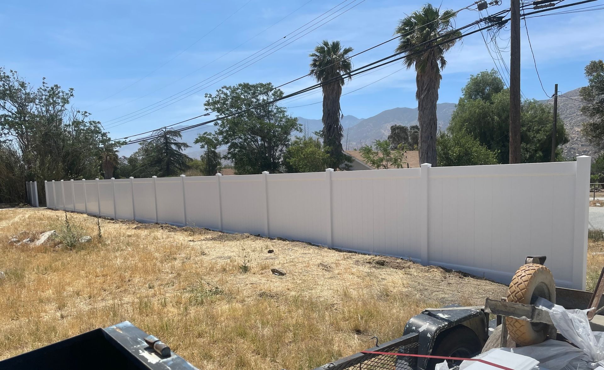 White Fence with Palm Trees — Nuevo, CA — Golden West Fence