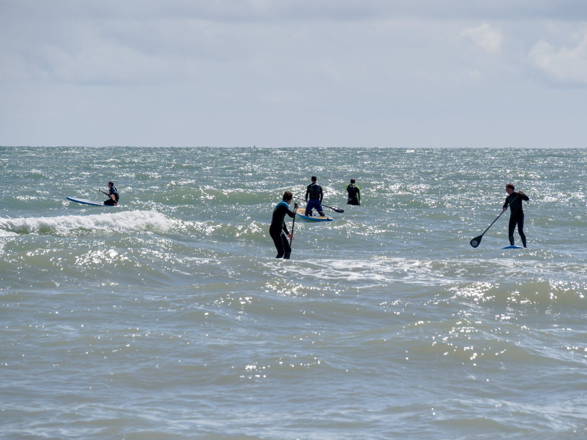 Photo of paddleboarders on the sea - Brighton, May 2014