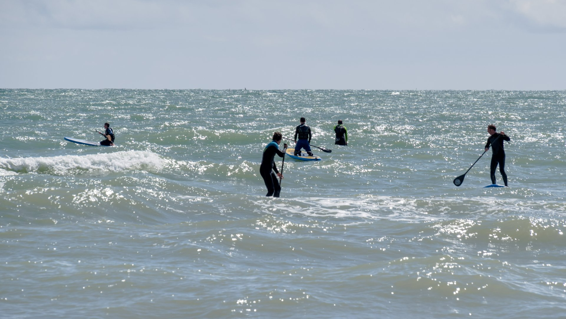 Photo of paddleboarders on the sea - Brighton, May 2014