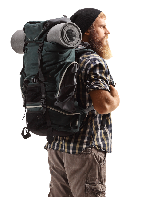 Bearded man with backpack, arms crossed, facing right, wearing a beanie and plaid shirt, ready for hiking.
