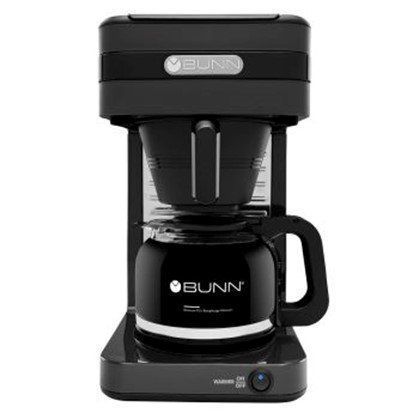 A black bunn coffee maker with a glass pot on a white background.