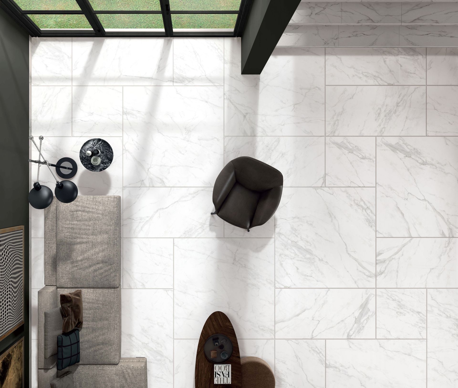 An aerial view of a living room with white tiles and furniture.