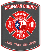Logo for Kaufman County Emergency Services District 7 Fire in Crandall, Texas, featuring a red Maltese cross and a star.