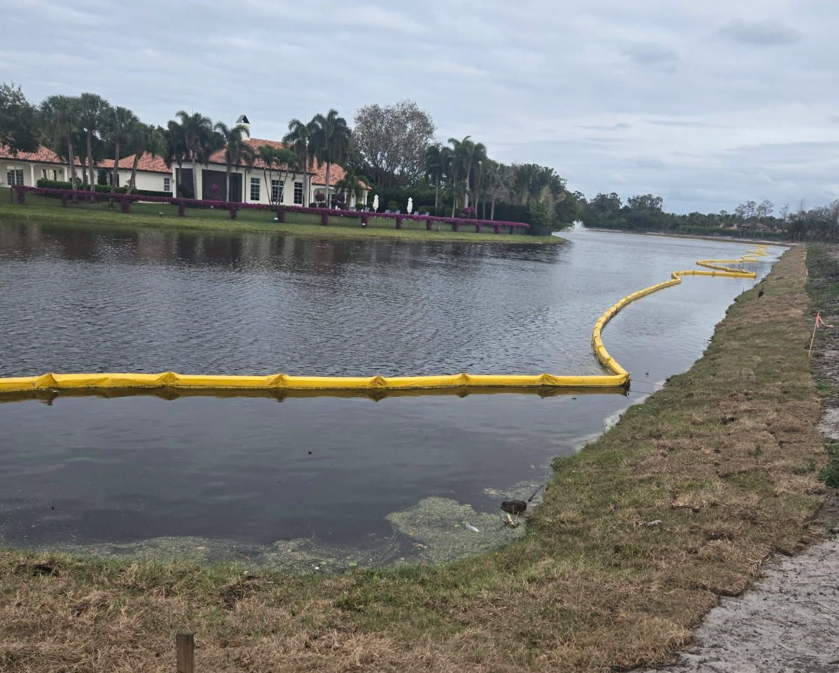 Type 1 DOT Floating Turbidity Barriers installed in pond protecting water from construction site runoff Type 1 DOT Floating Turbidity Barriers installed in pond protecting water from construction site runoff