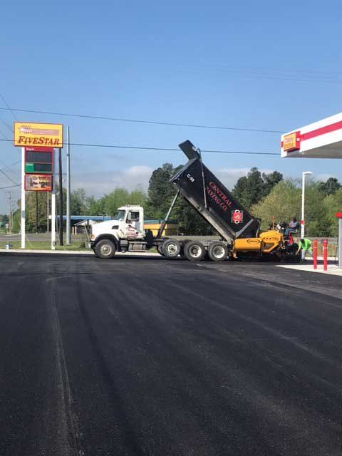 Gallery Subdivision Paving — Company Truck Near Commercial Establishment in Work in Paducah, KY