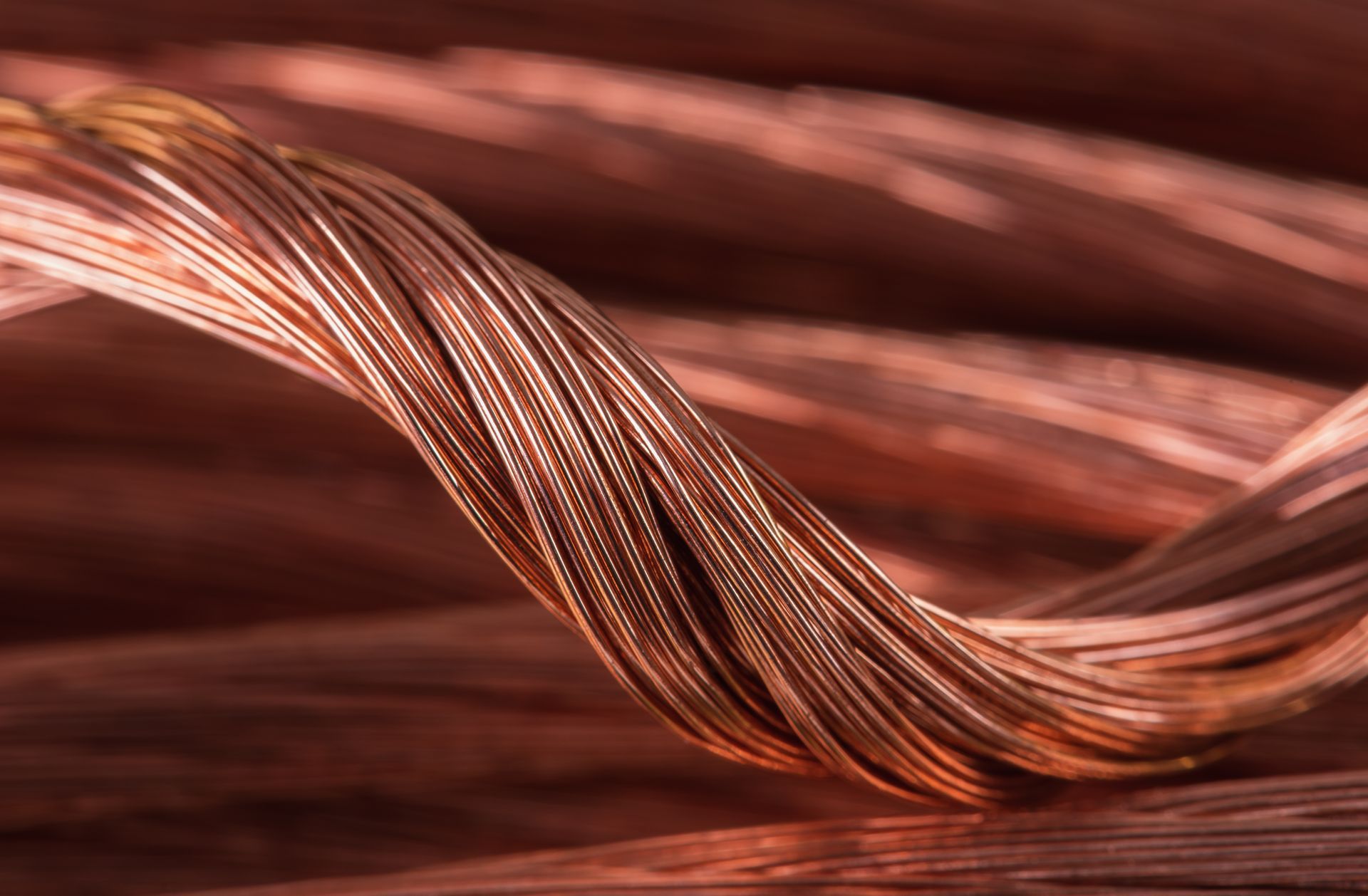 A close up of a bunch of copper wires on a table.