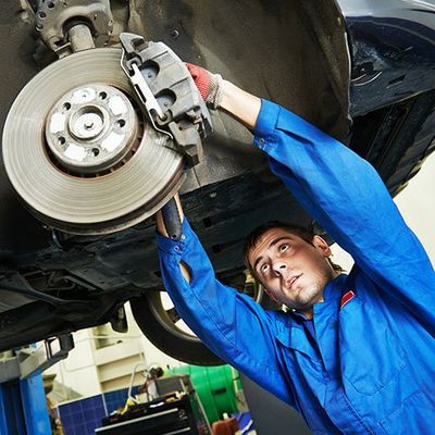 Brake Services — Man Repairing c in Medford, OR