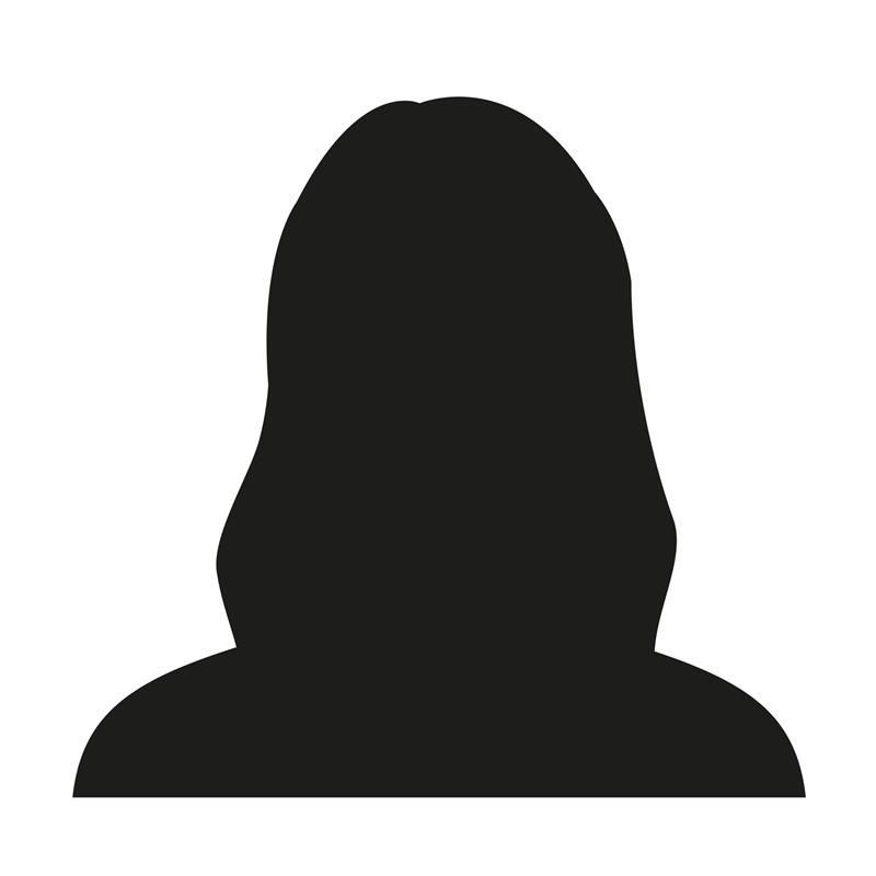 Silhouette of a person with shoulder-length hair and shoulders.