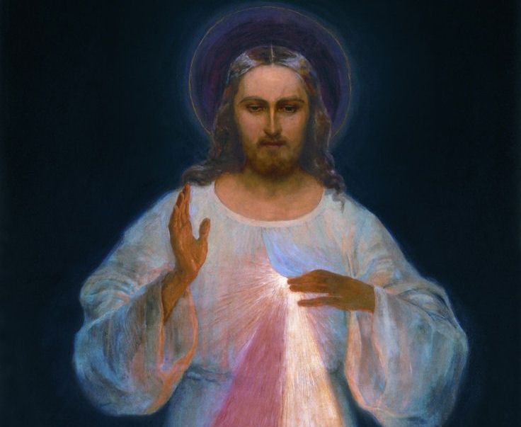 A painting of jesus' Divine Mercy with rays coming out of his chest.