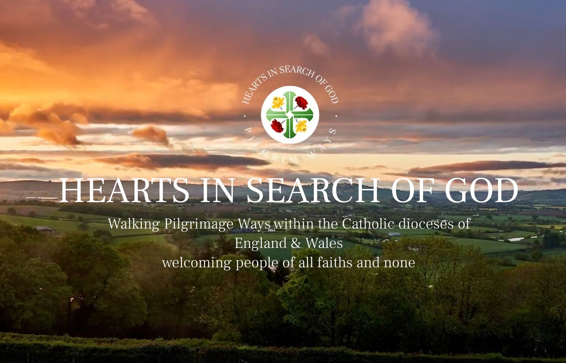 A poster for hearts in search of god with a sunset in the background.